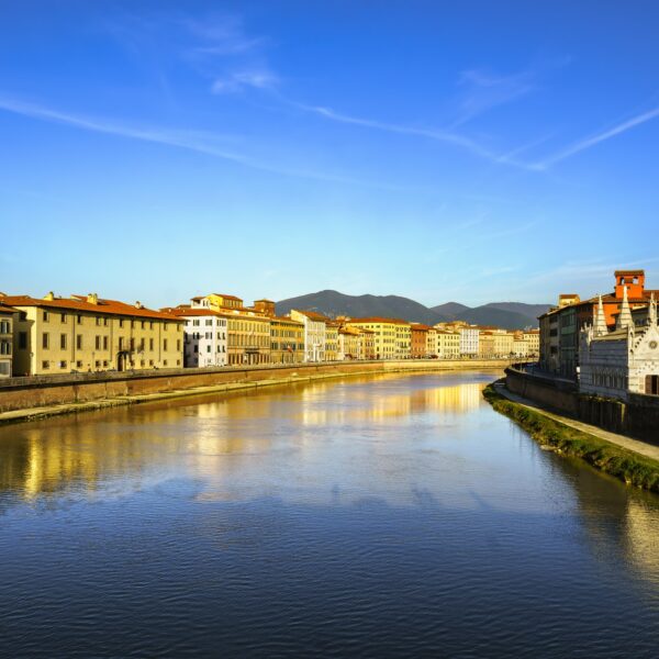 Pisa, Arno river sunset. Lungarno view and Santa Maria della Spi